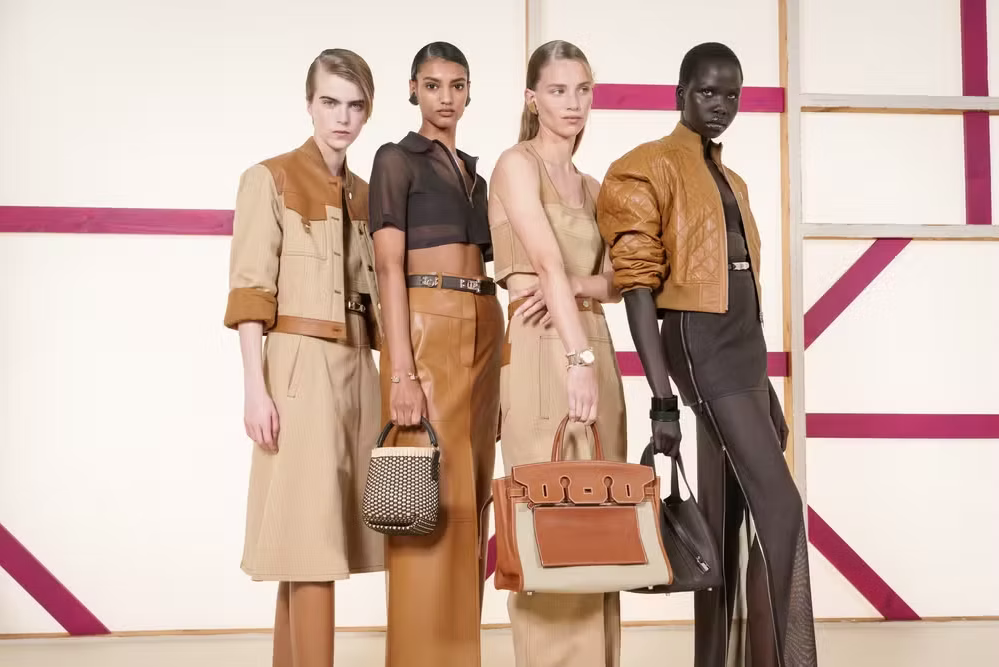 4 female models wearing Hermès outfit