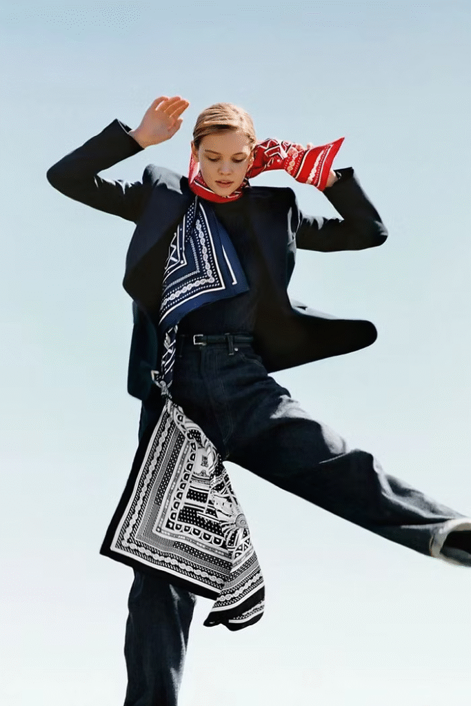 Female model wearing black outfit for a Hermès campaign