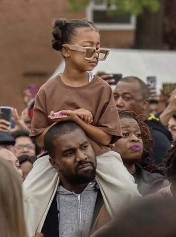 Kanye West "Ye" with his daughter