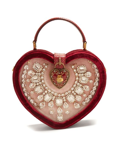 Heart-shaped velvet handbag with intricate jewel-like embellishments and a decorative heart lock detail.